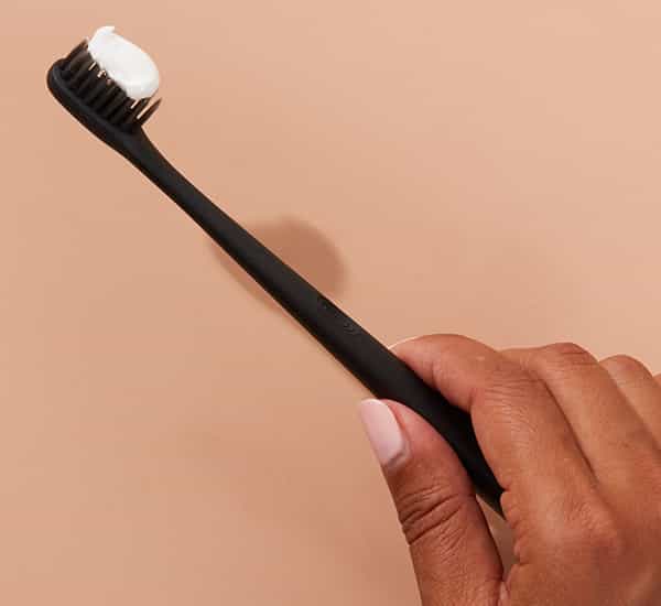 qué es el sls en la pasta de dientes