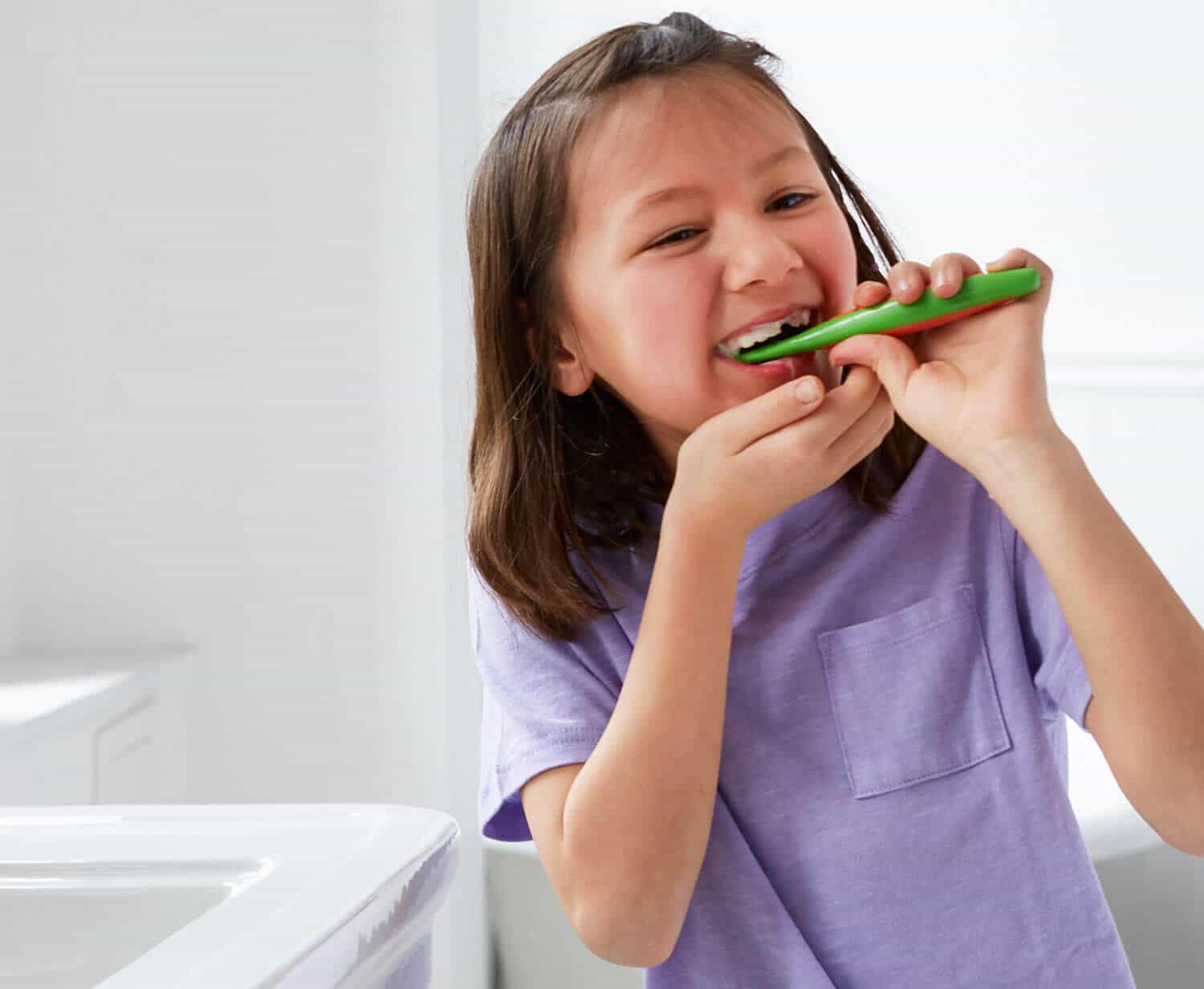 niños lavandose los dientes